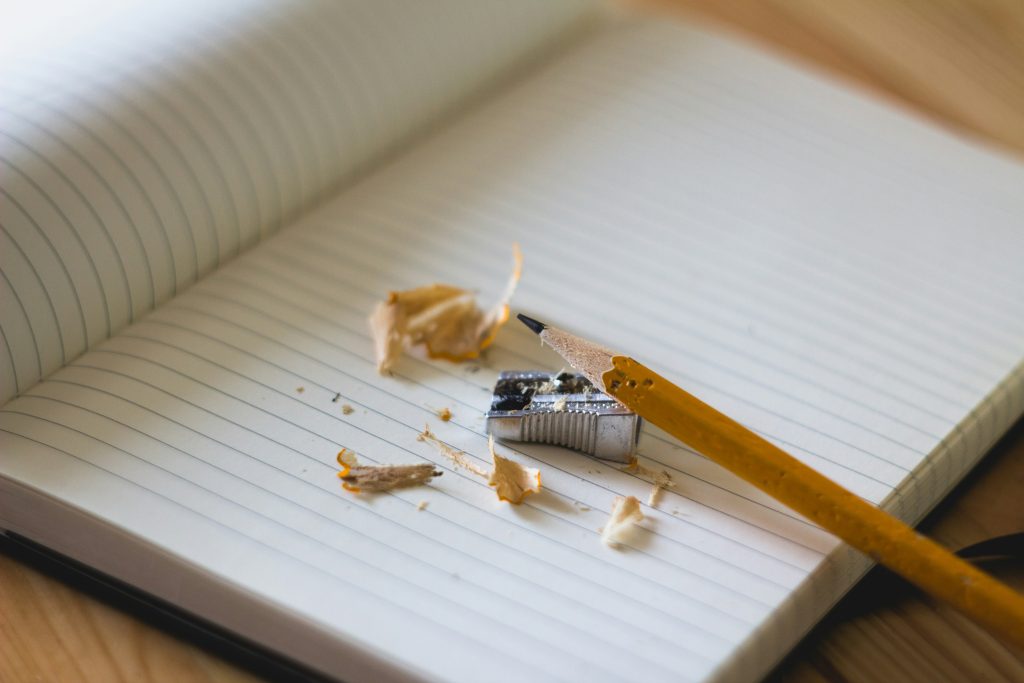 back to school | The Urgent Care Pencil and shavings on a textbook